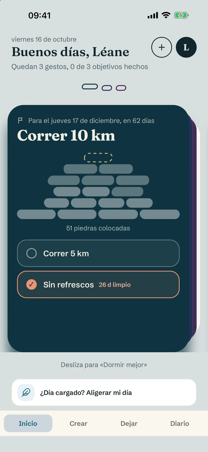 Pantalla de inicio de Yolmira con una tarjeta de objetivo, su cairn de piedras y dos hábitos