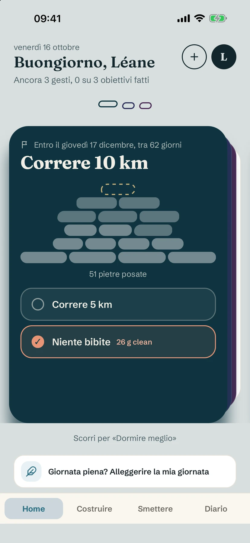 Schermata Home di Yolmira con una scheda obiettivo, il suo cairn di pietre e due abitudini