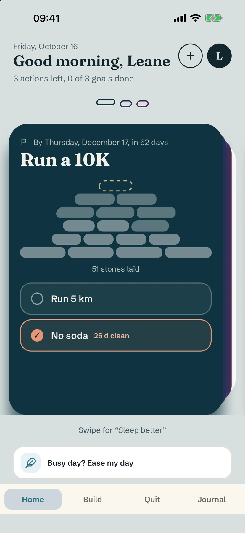 Yolmira home screen showing the goal Run a 10K with a cairn of 51 stones and two habits for today: Run 5 km and No soda